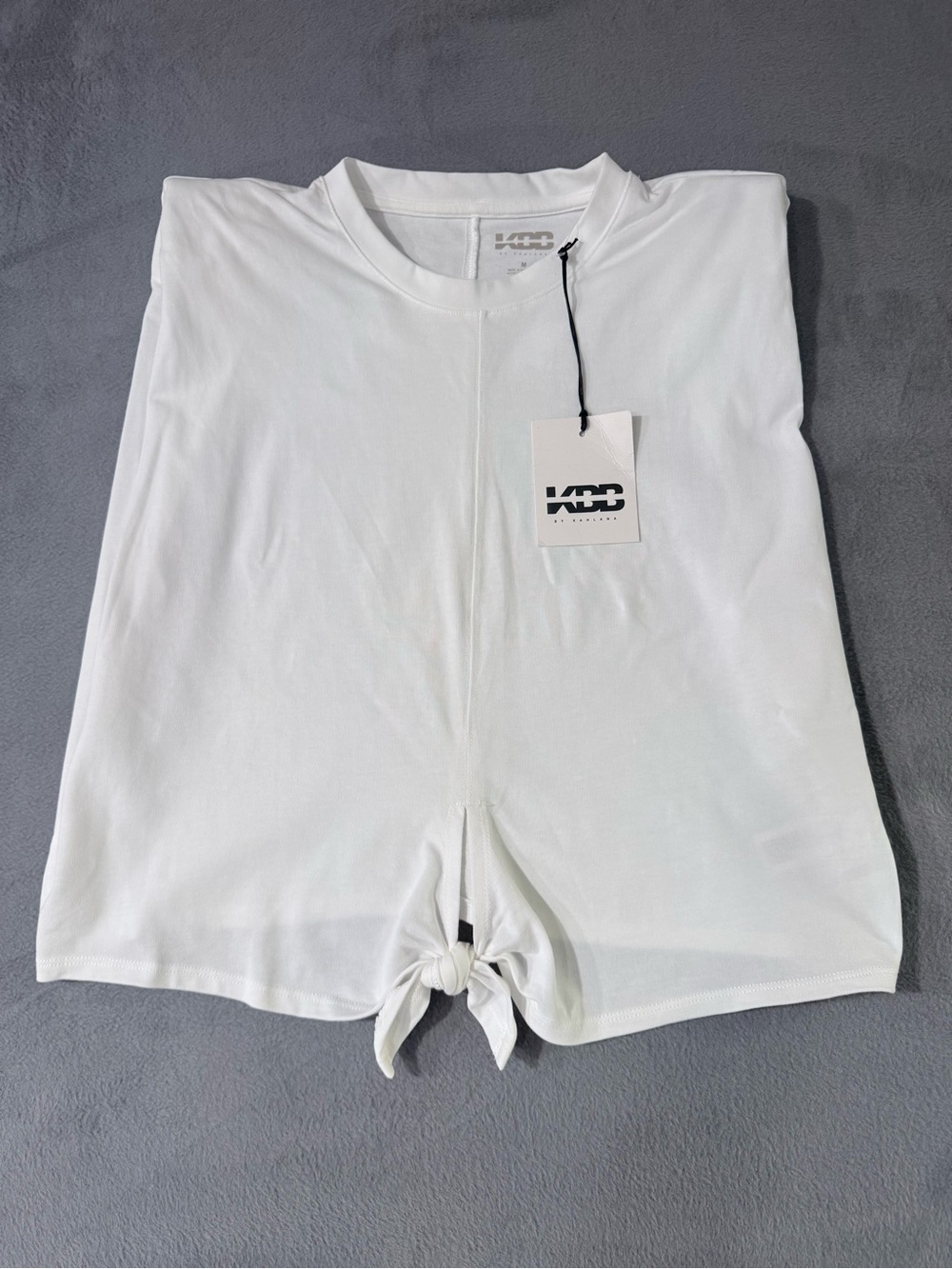 KBB by KAHLANA - Women's 'The Sleeveless
Tie-Front Tank'